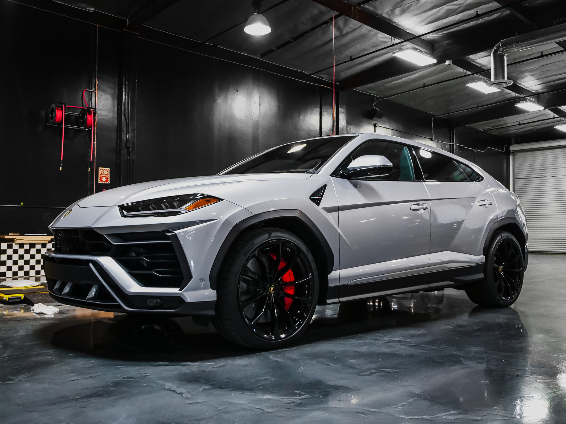 Modern car in lightning service garage